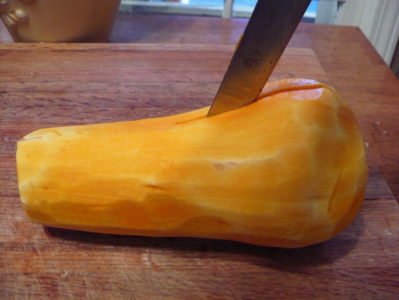 Cut the butternut squash in half