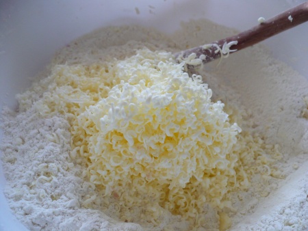 Grated Butter about to be mixed into flour